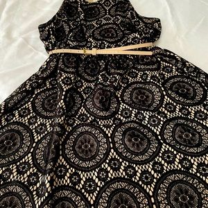 Beautiful plus size dress. Cream color lining with black lace over it.